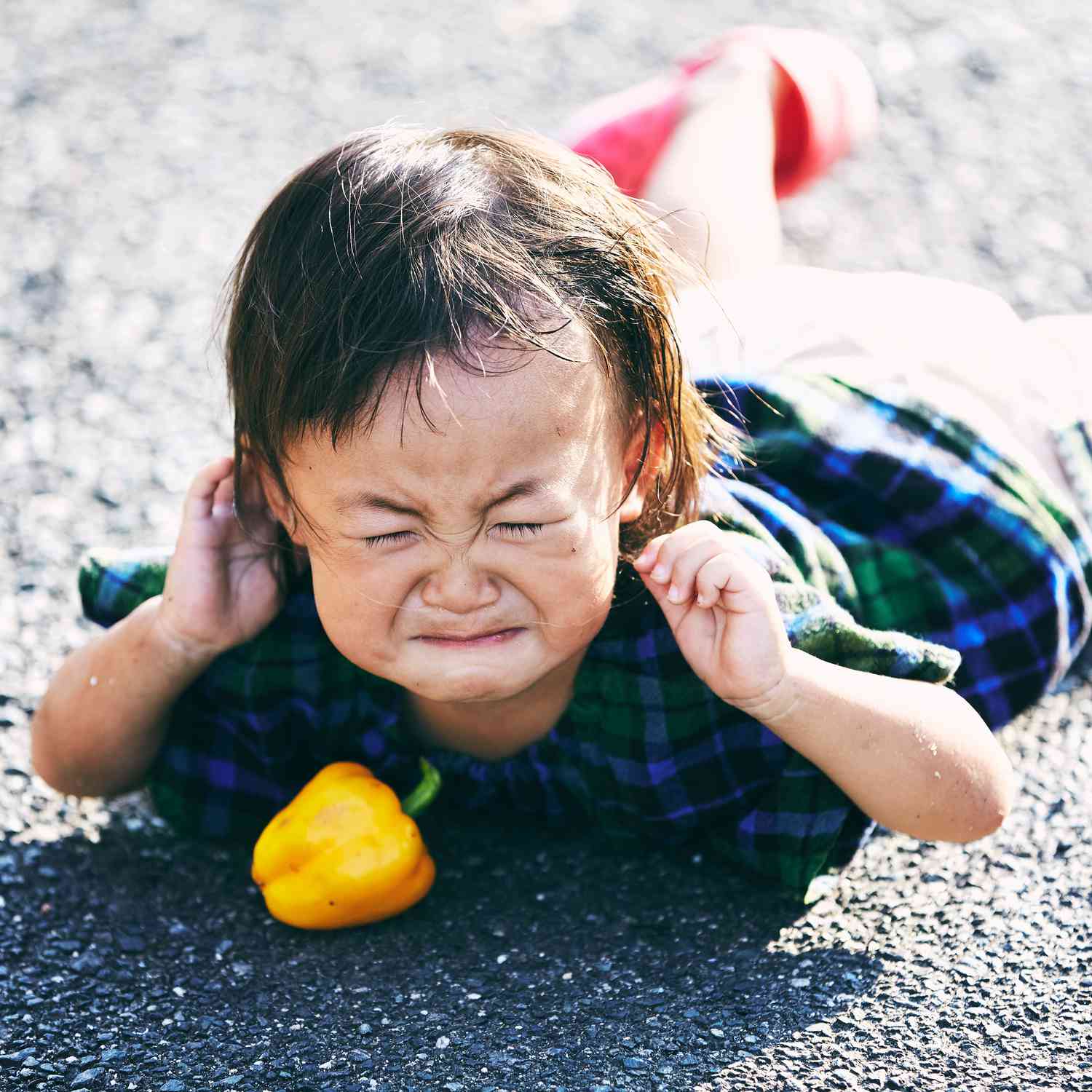 asian child throwing tantrum