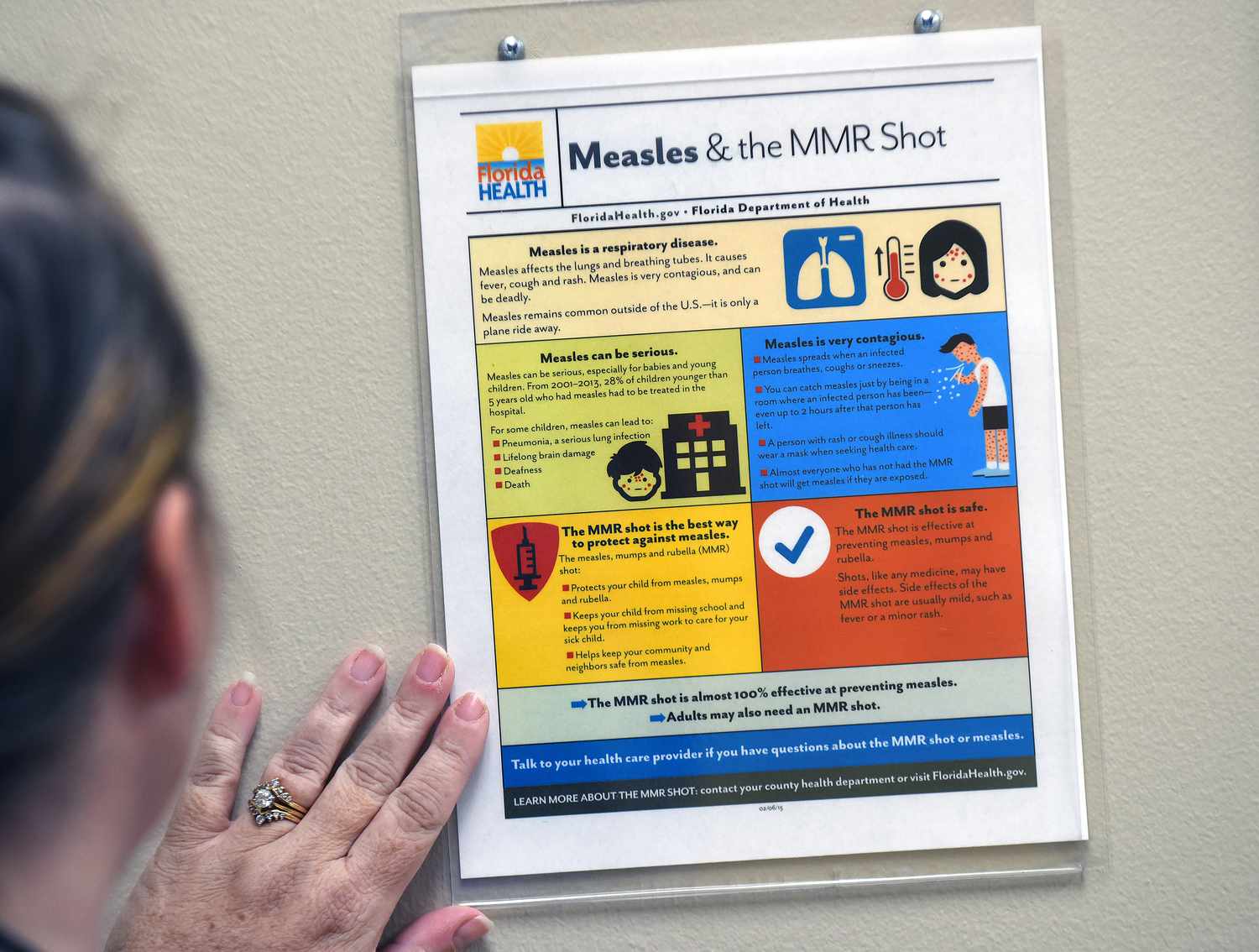 A measles information sheet is seen posted at the Orange County Health Department on May 6, 2019 in Orlando, Florida.