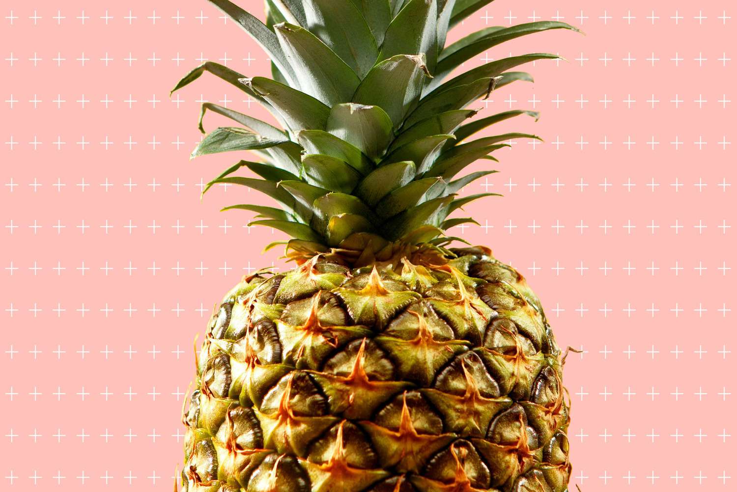 pineapple in front of plus signs