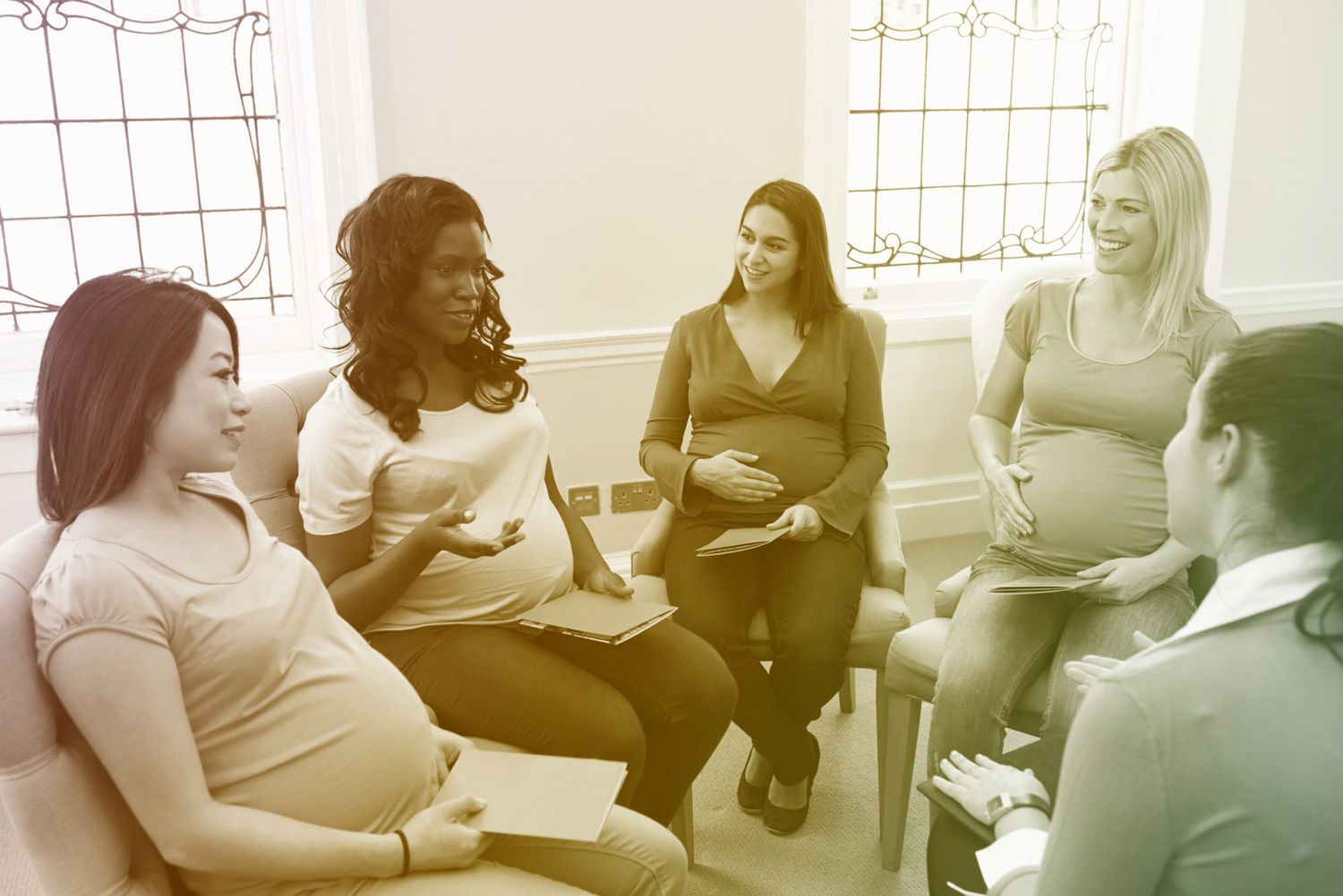 pregnant women sitting in a circle