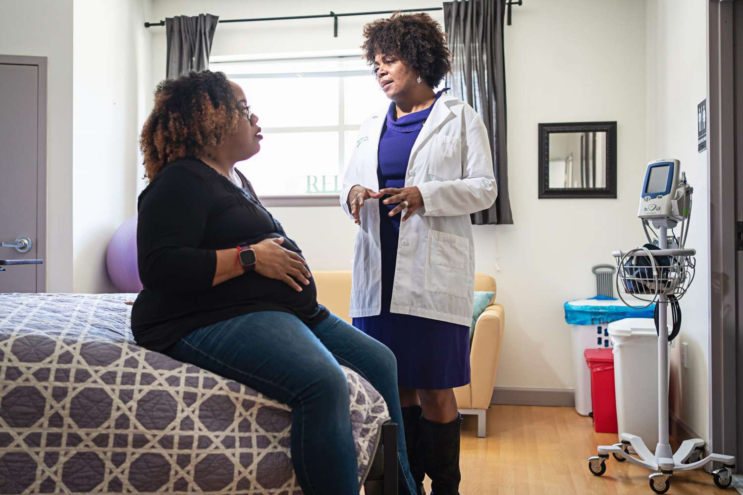 Dr. Joia Crear Perry with Ebony Roebuck, Director of Midwifery at the Community of Hope Family Health and Birth Center, Washington, D.C., on March 2, 2020.