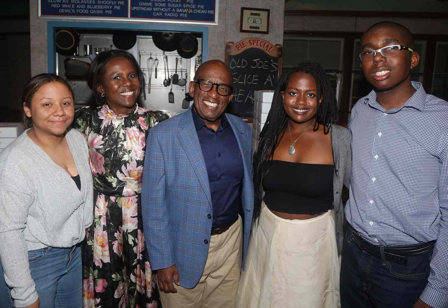 An image of Al Roker and Deborah Roberts with their family.