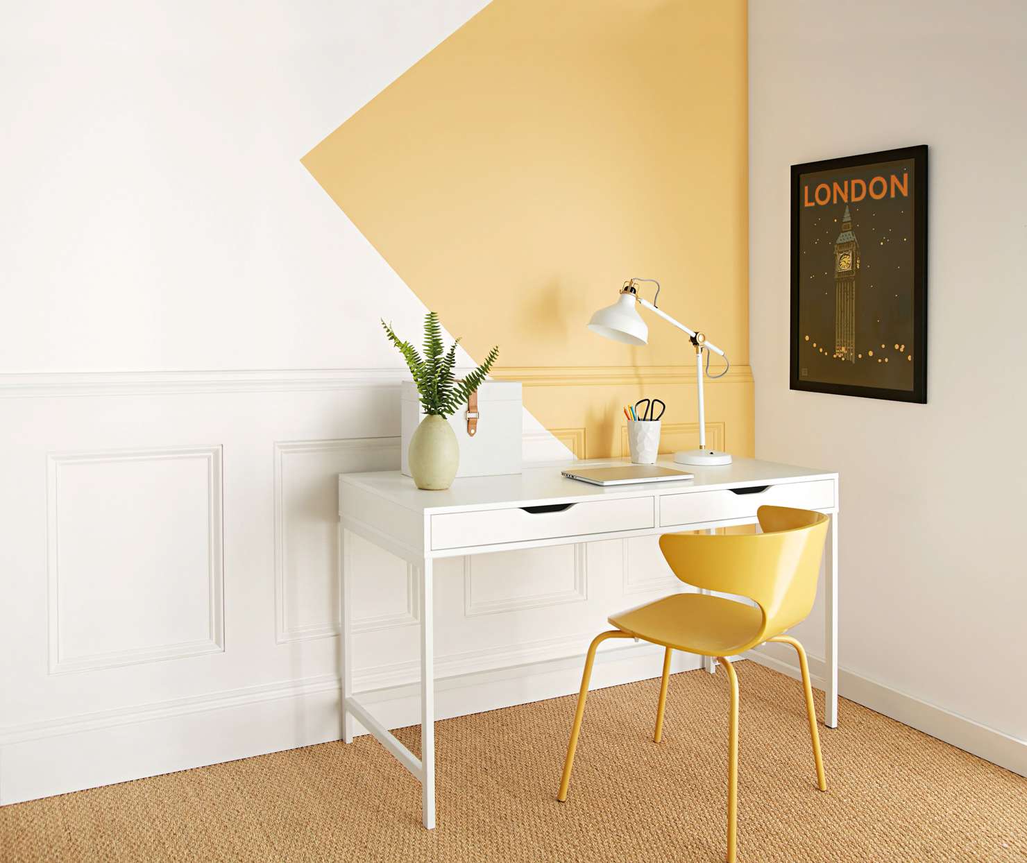 white wall with yellow triangle accent