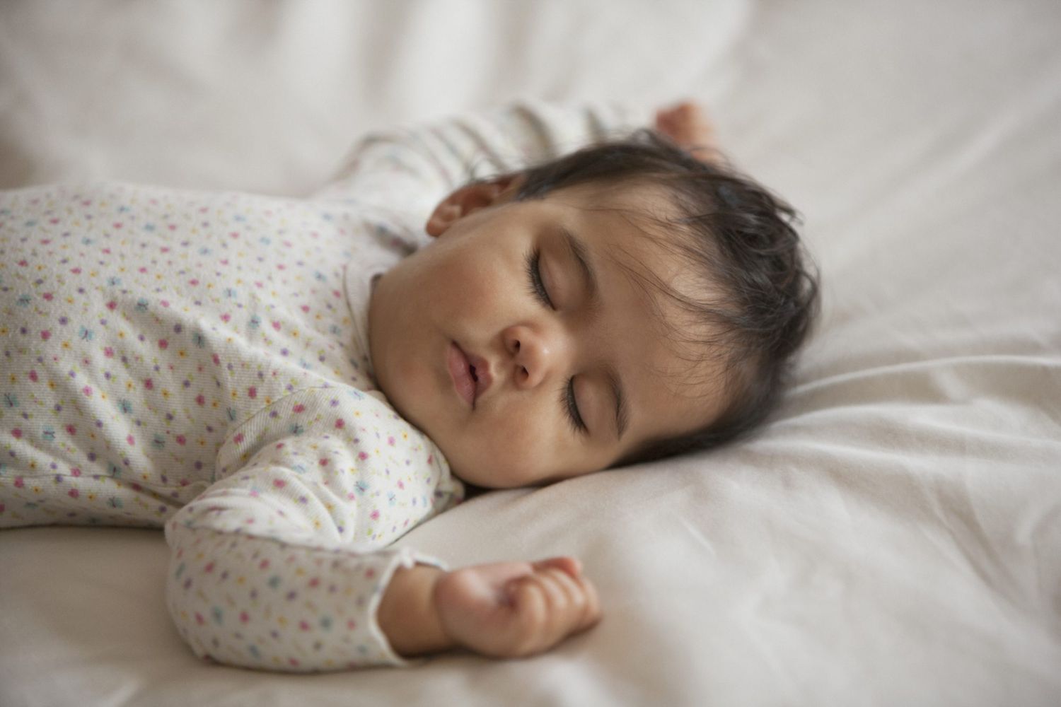 An image of a baby sleeping.