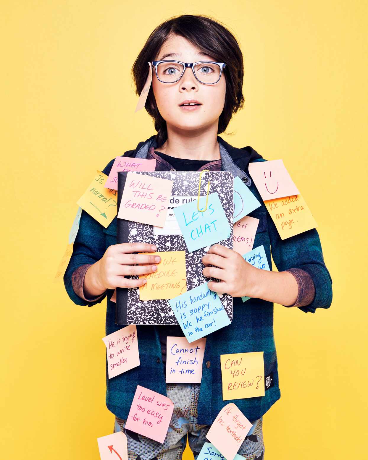 kid covered in sticky notes