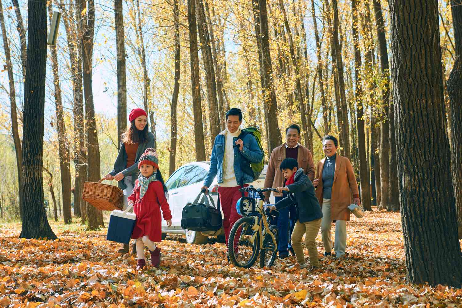 An image of a family on a trip in the fall.