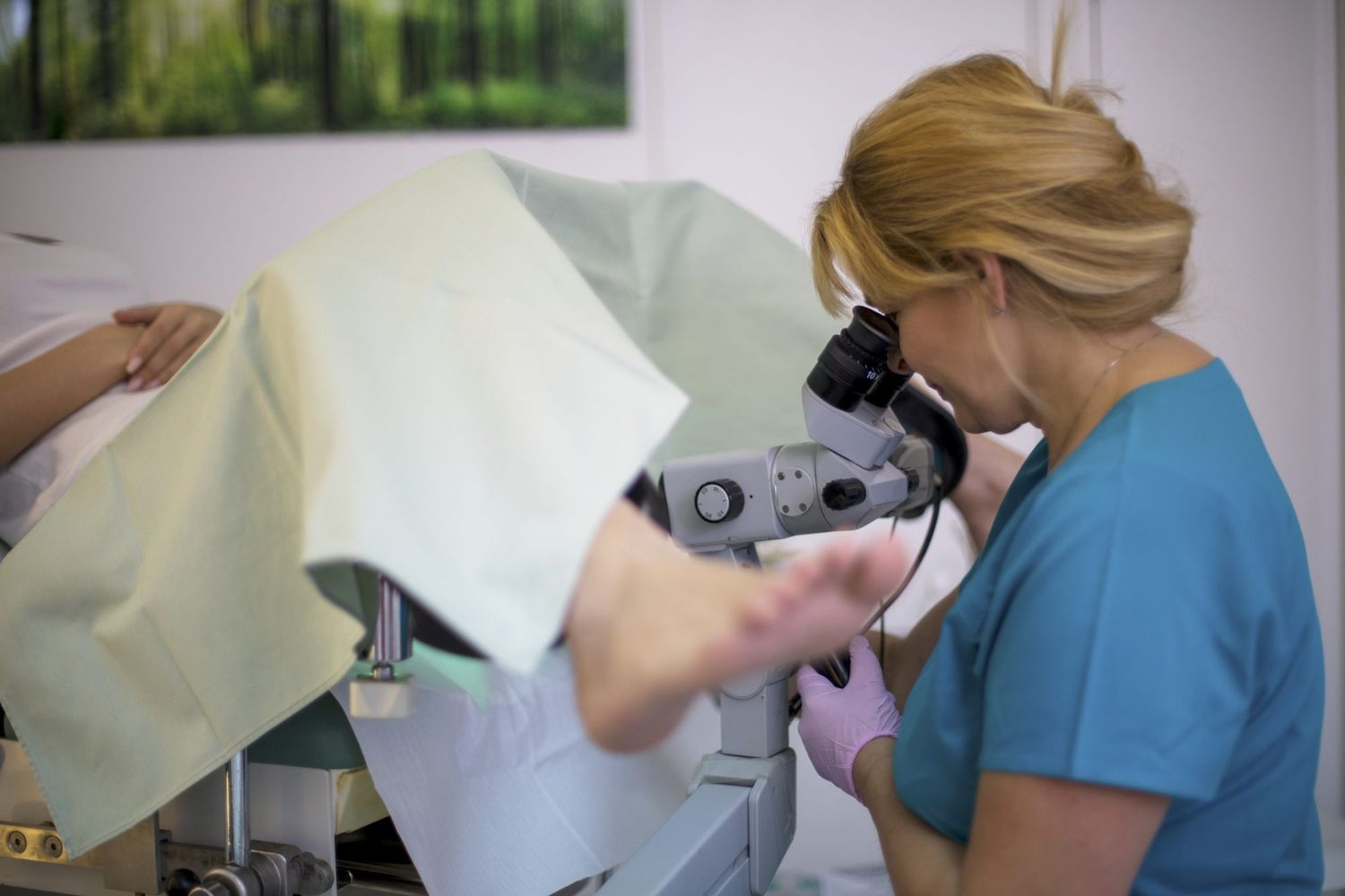 An image of a gynecologist looking at a woman's cervix.
