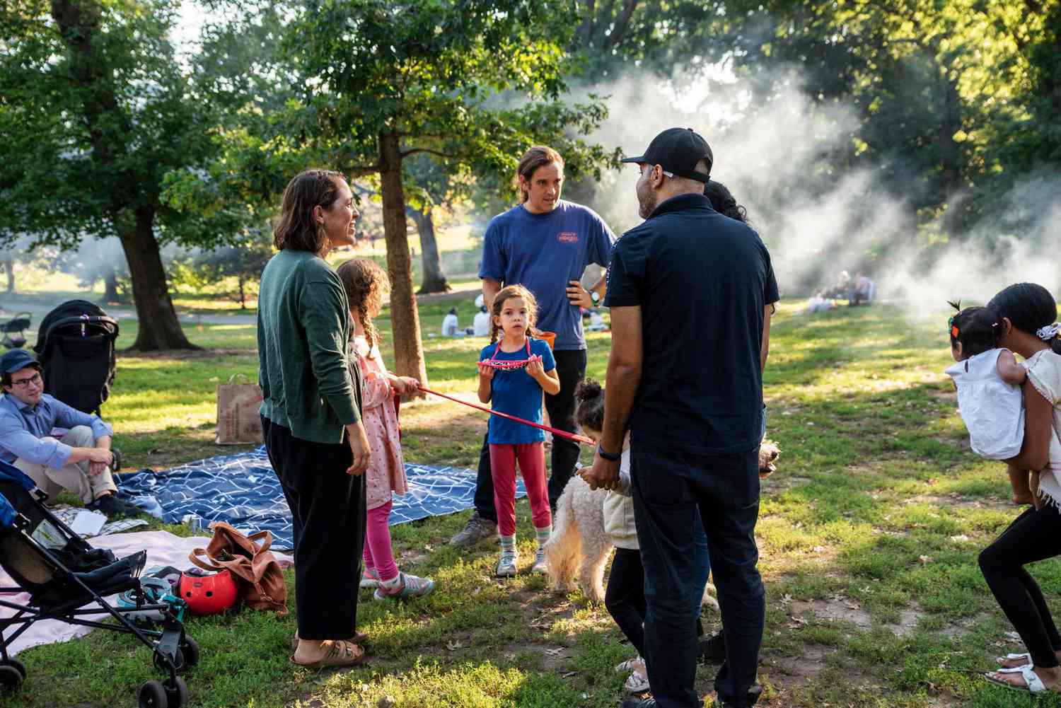 An image of a gathering of families during a picnic for the New Neighbors Project.