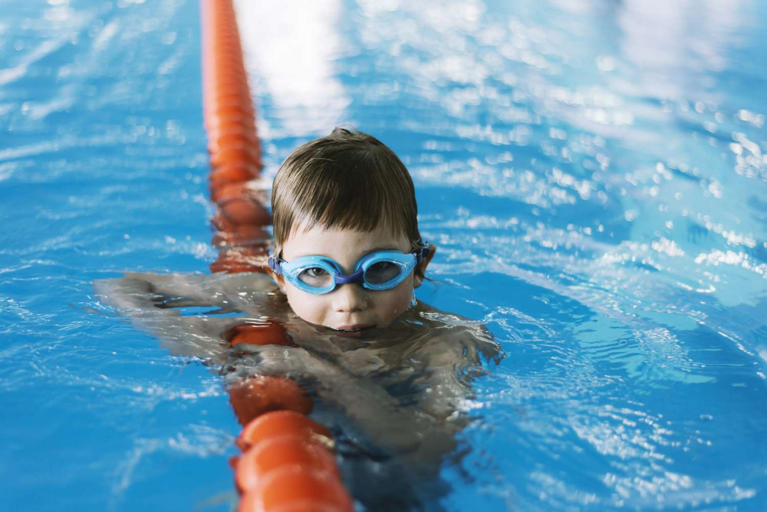 An image of boy during swimming lessons.
