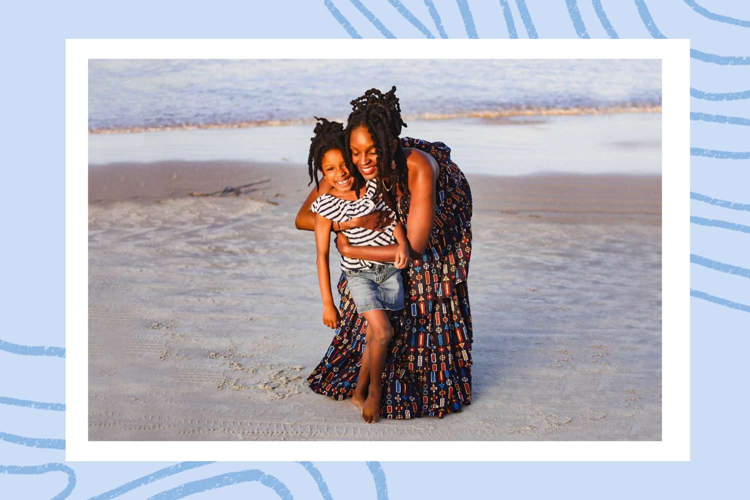 Shanicia Boswell and her daughter on a beach