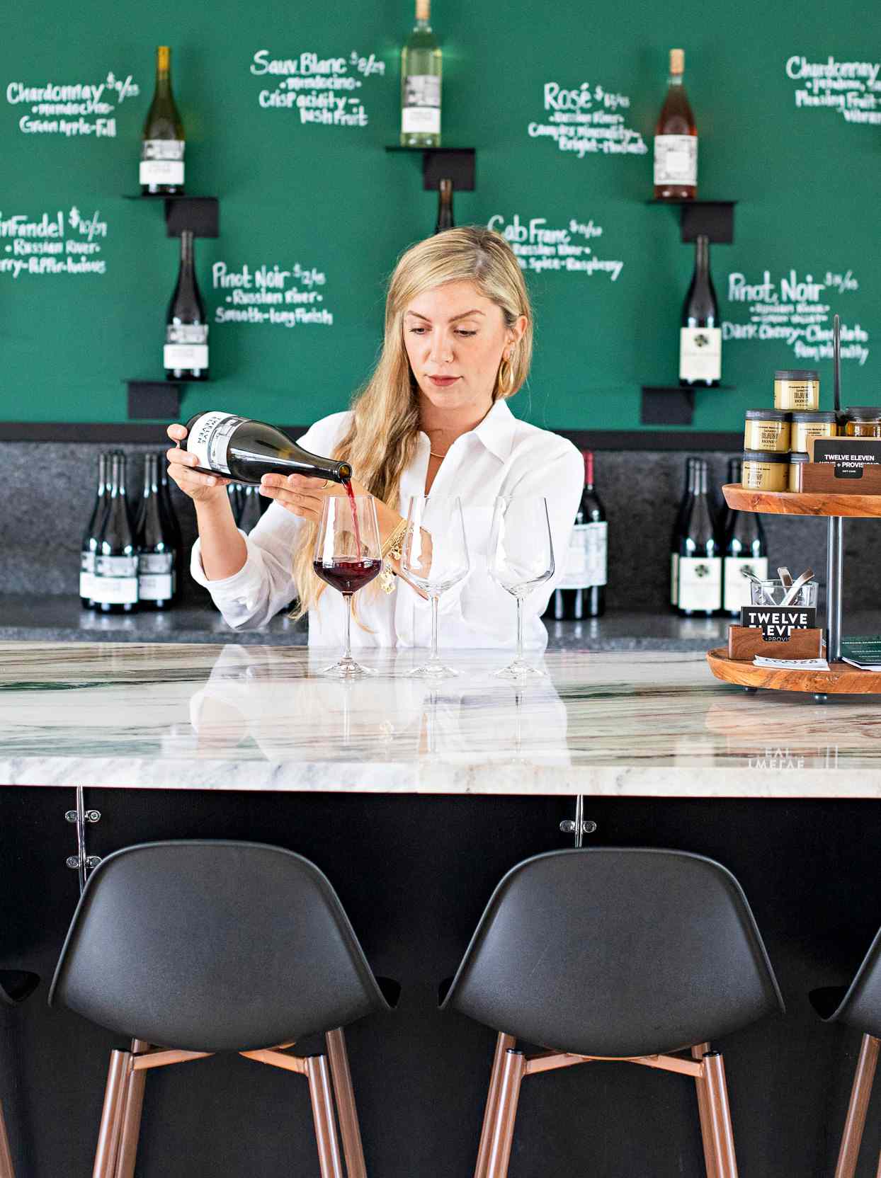 pouring wine at bar