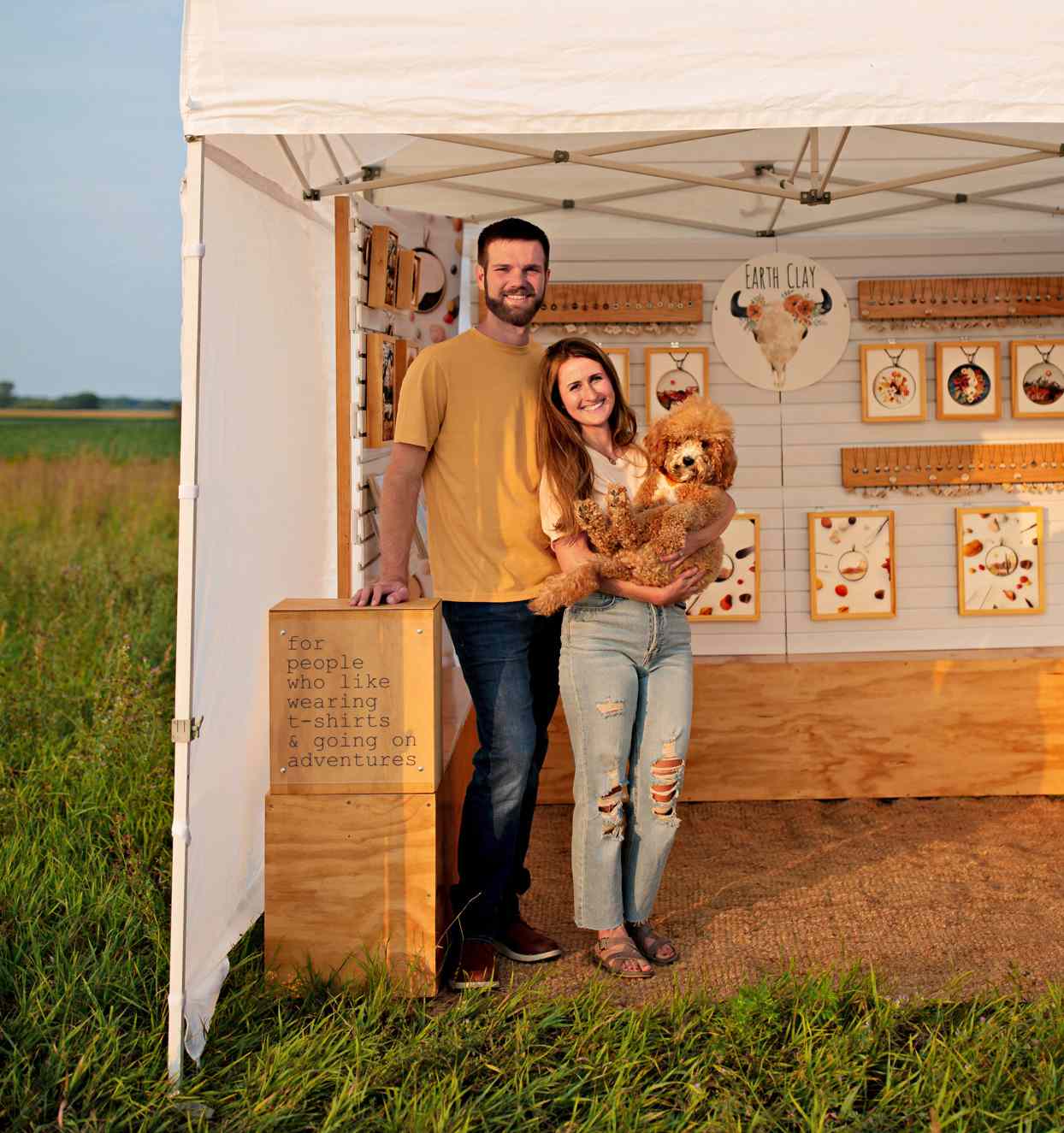 couple portrait with dog and clay art