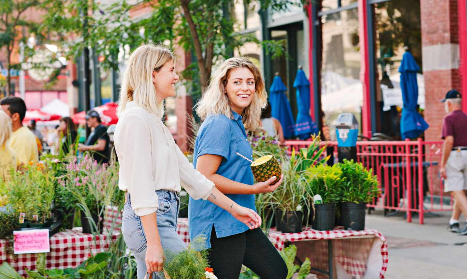 two women at downtown farmers market