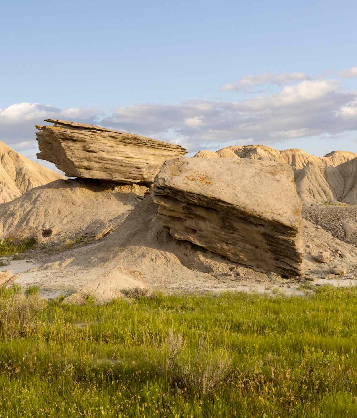 Unusual formations of large, hard rocks balanced on eroding softer material give Toadstool Geologic Park its name.