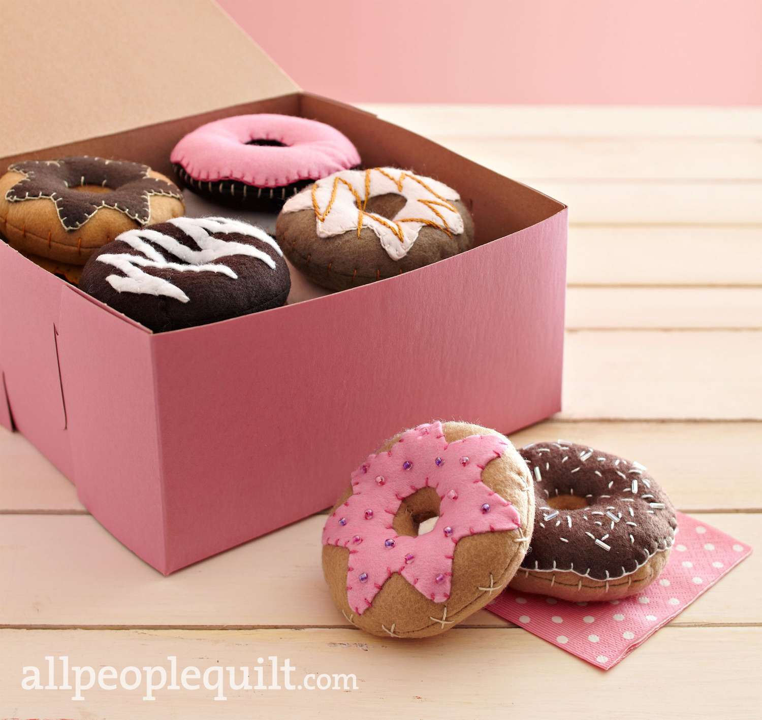 Felt donut pincushions in bakery box