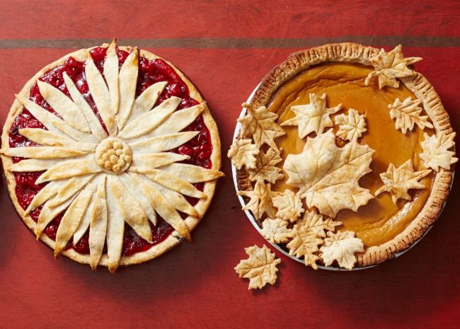 berry pie and pumpkin pie with decorative top crusts