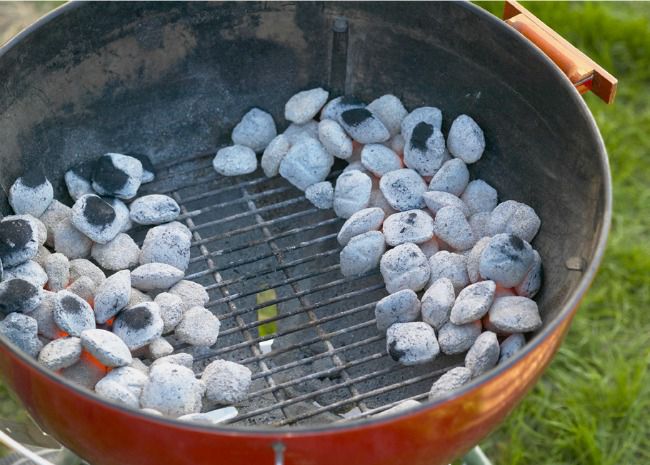 Charcoal arranged for indirect grilling
