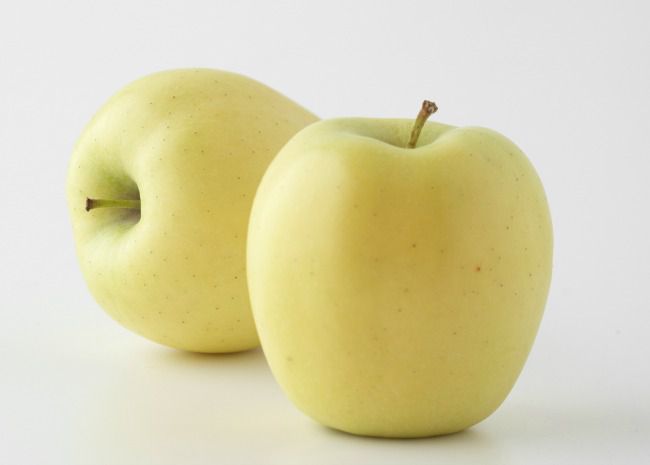 two golden delicious apples