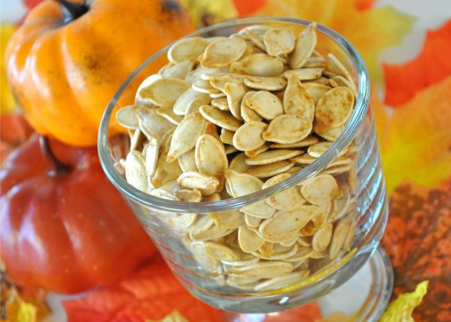 Toasted pumpkin seeds in a glass dish