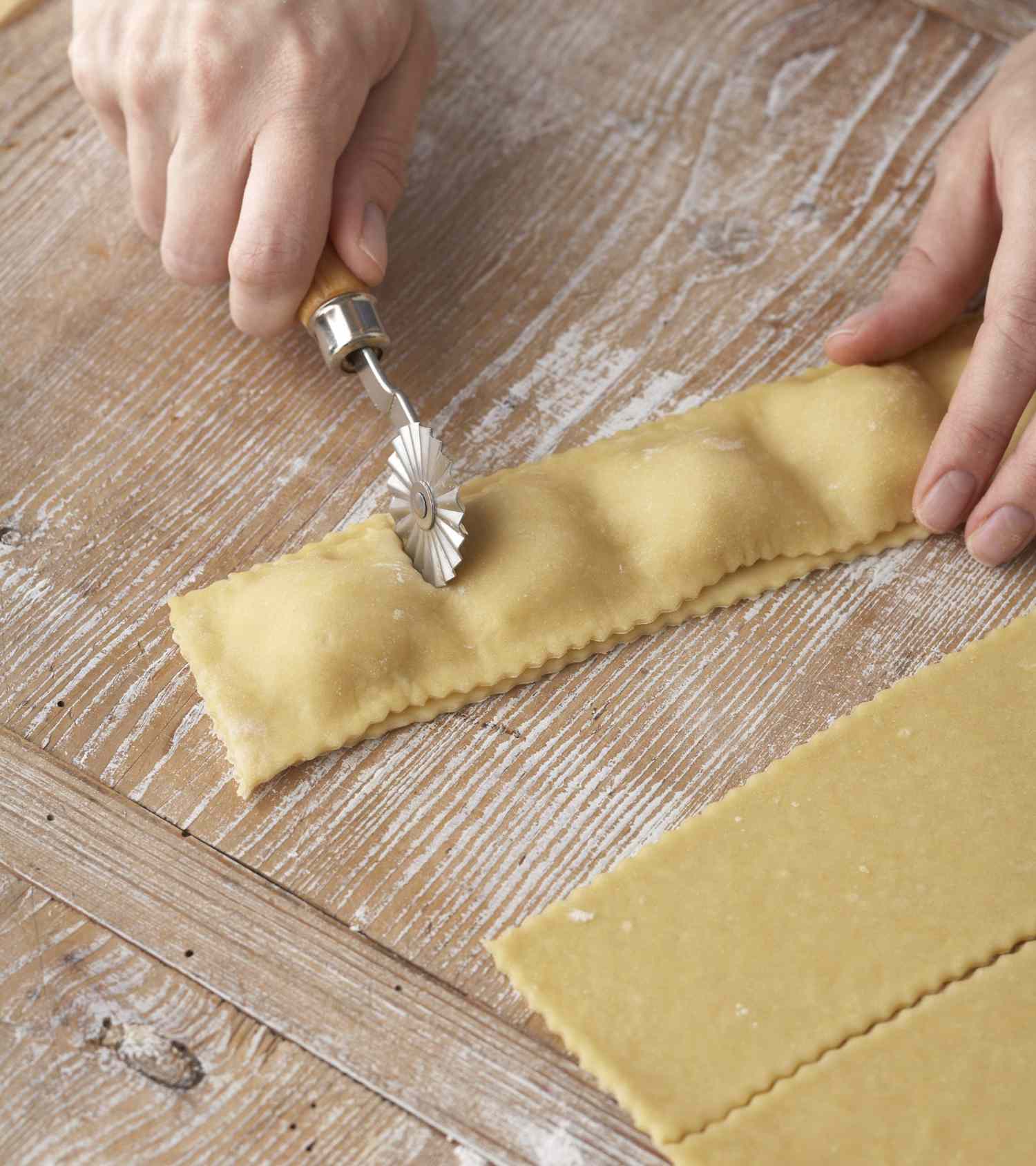 cutting strips into individual ravioli