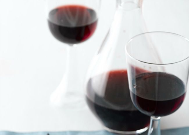 Red wine in glass and carafe