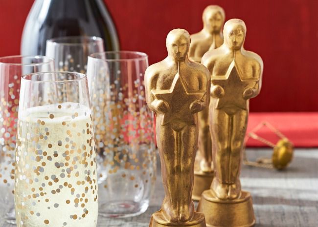Oscar Party accessory ideas: champagne glasses and mini Oscar statuettes