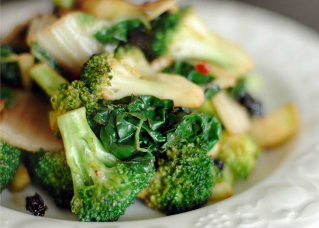closeup of kale and broccoli on a plate