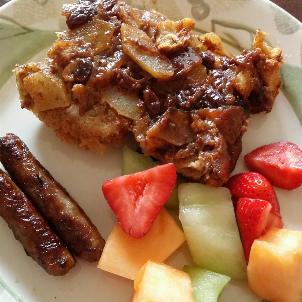 french toast casserole with side of sausage and fruit