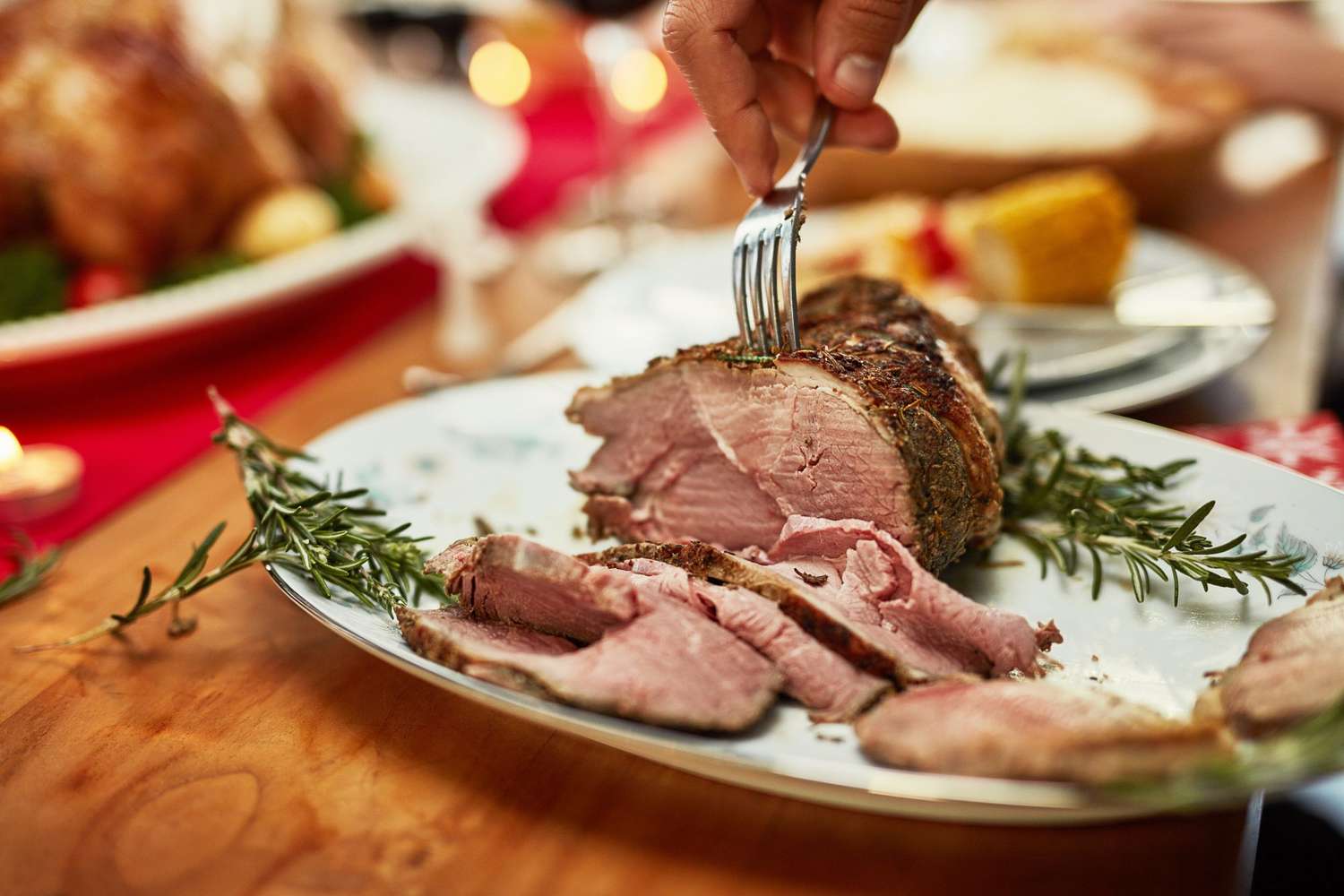 Cropped shot of roast beef on a dining table