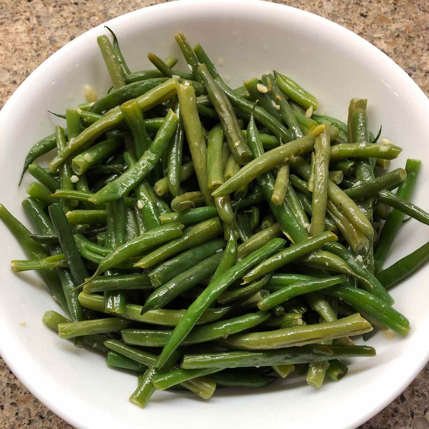 Buttery Garlic Green Beans in a white bowl