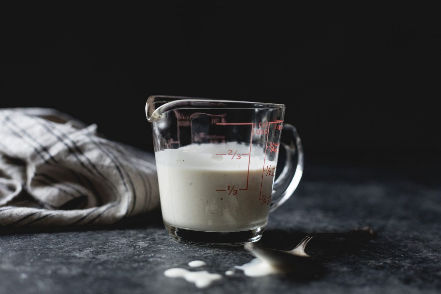 buttermilk in a measuring cup