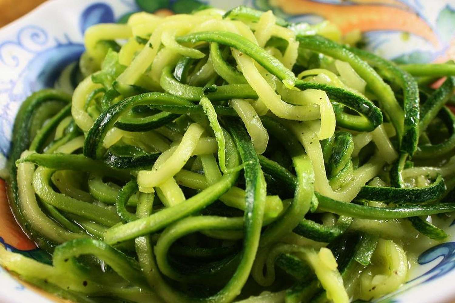 Low-Carb Zucchini Pasta on blue and white plate