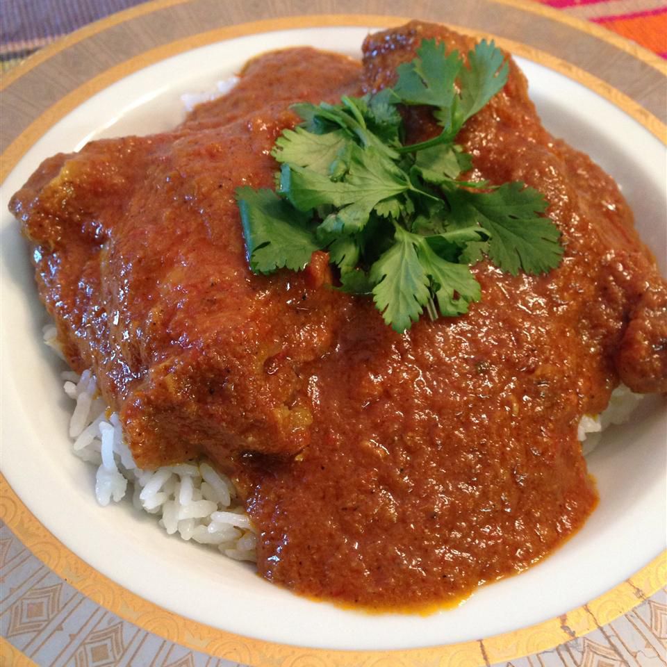 chicken over rice in tomato sauce