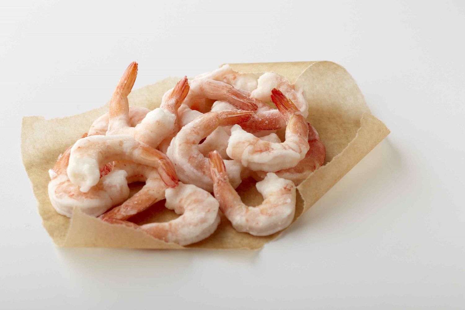 Frozen shrimp on parchment paper