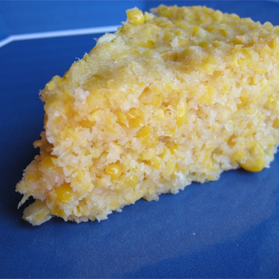 slice of Sweet Corn Cake on a blue plate