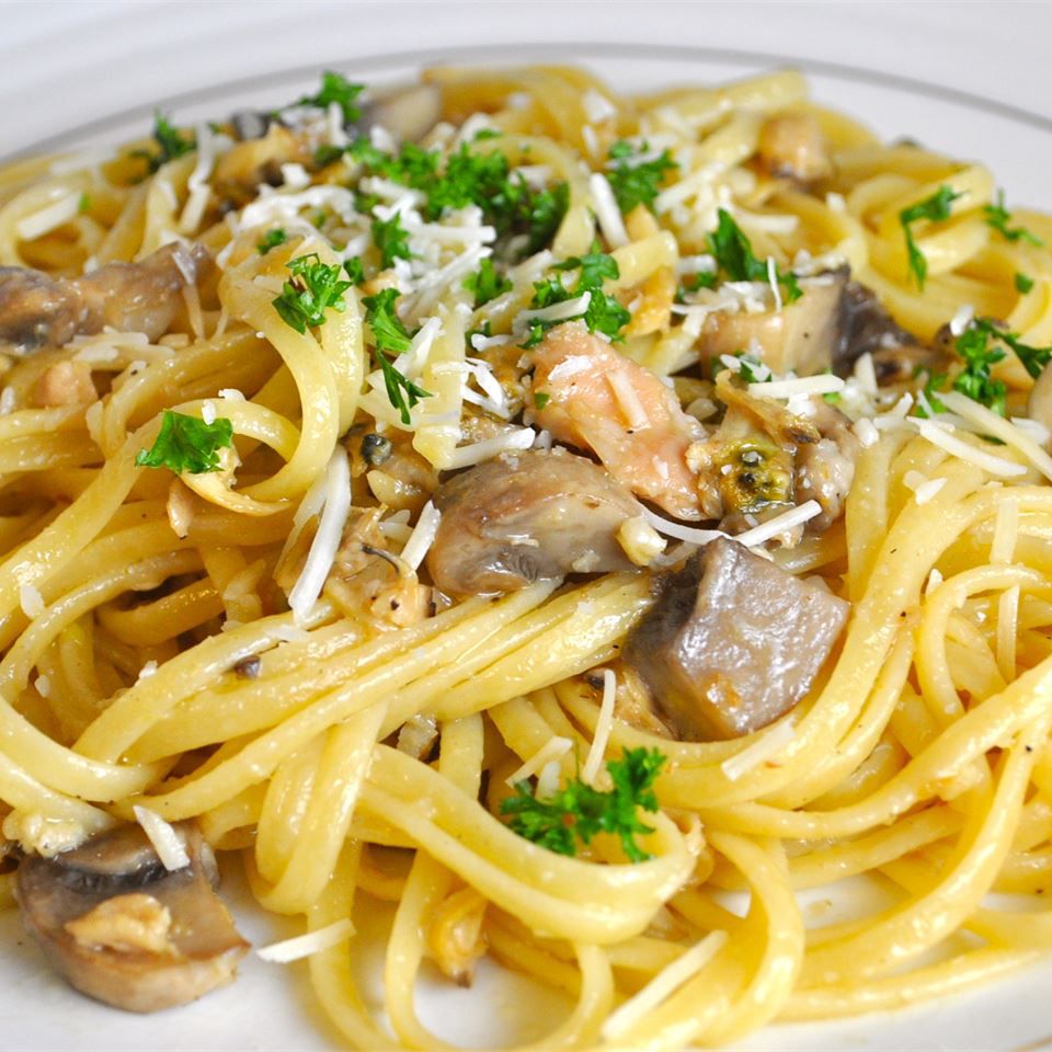 linguine with clams on a white plate