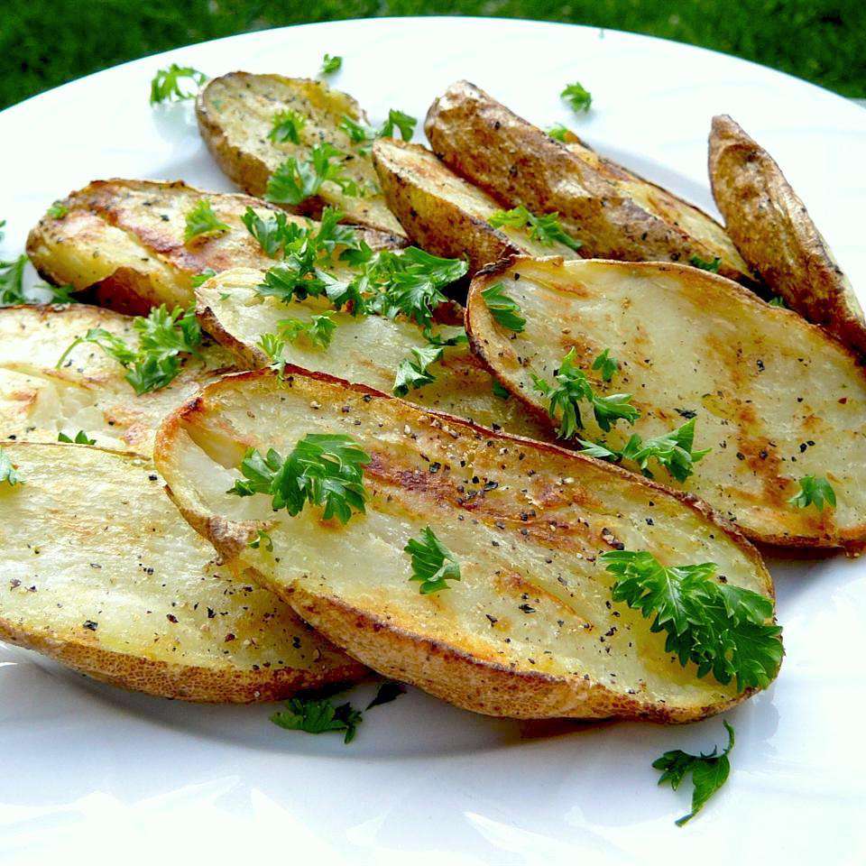 Grilled Baked Potatoes on a white plate