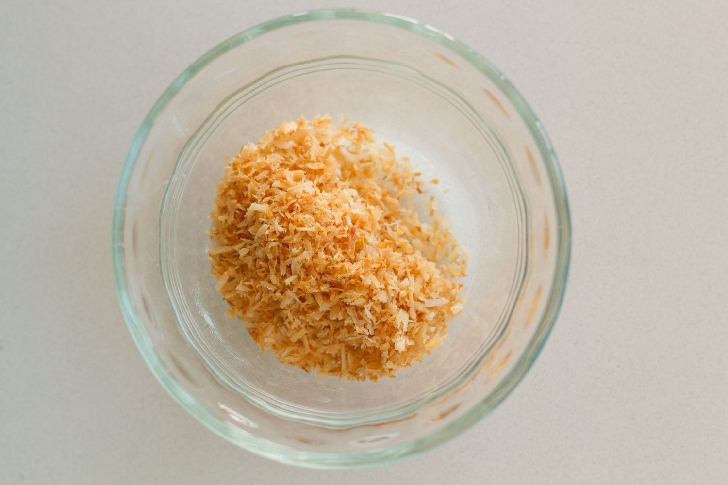 toasted coconut in glass bowl