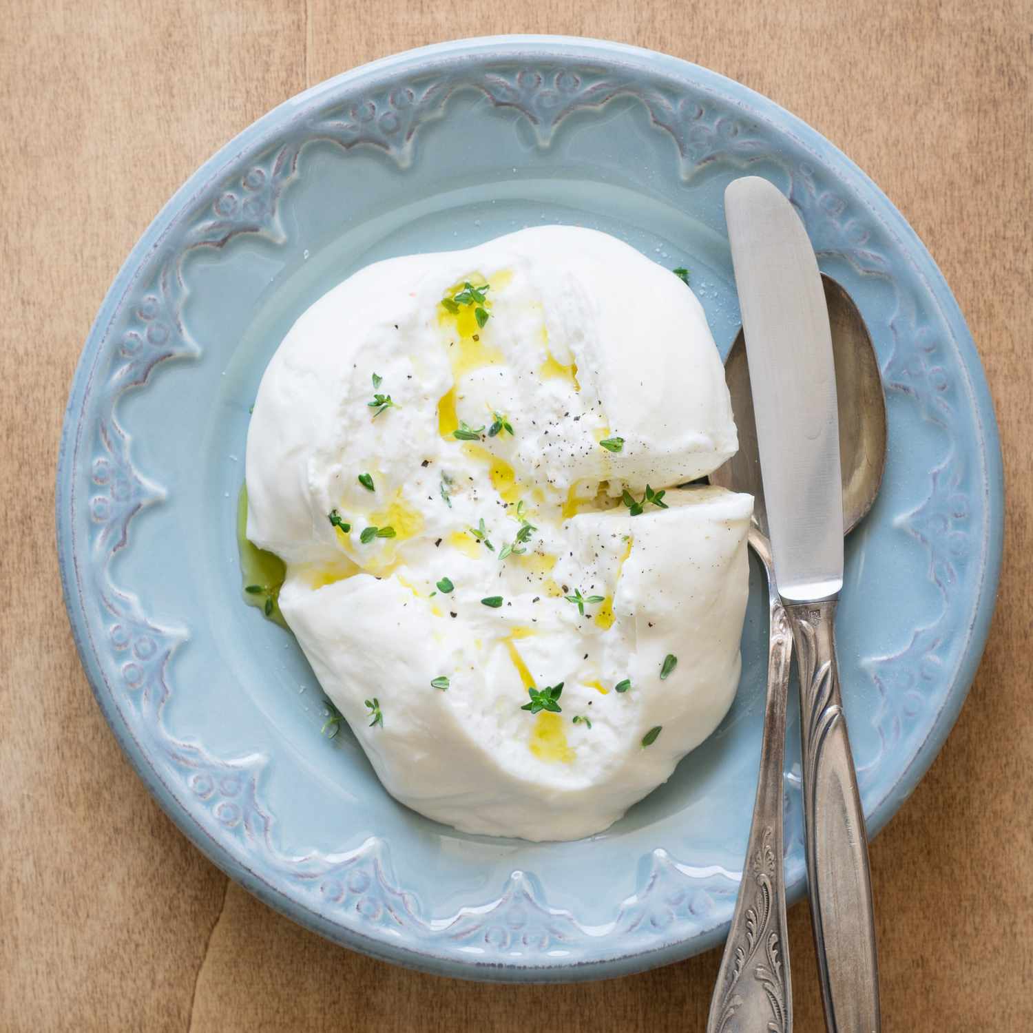 Apulien Burrata cheese with olive oil, thyme, salt and pepper