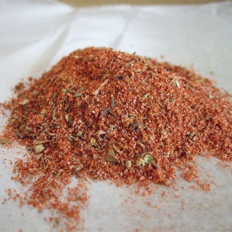 closeup of a reddish heap of ground spices