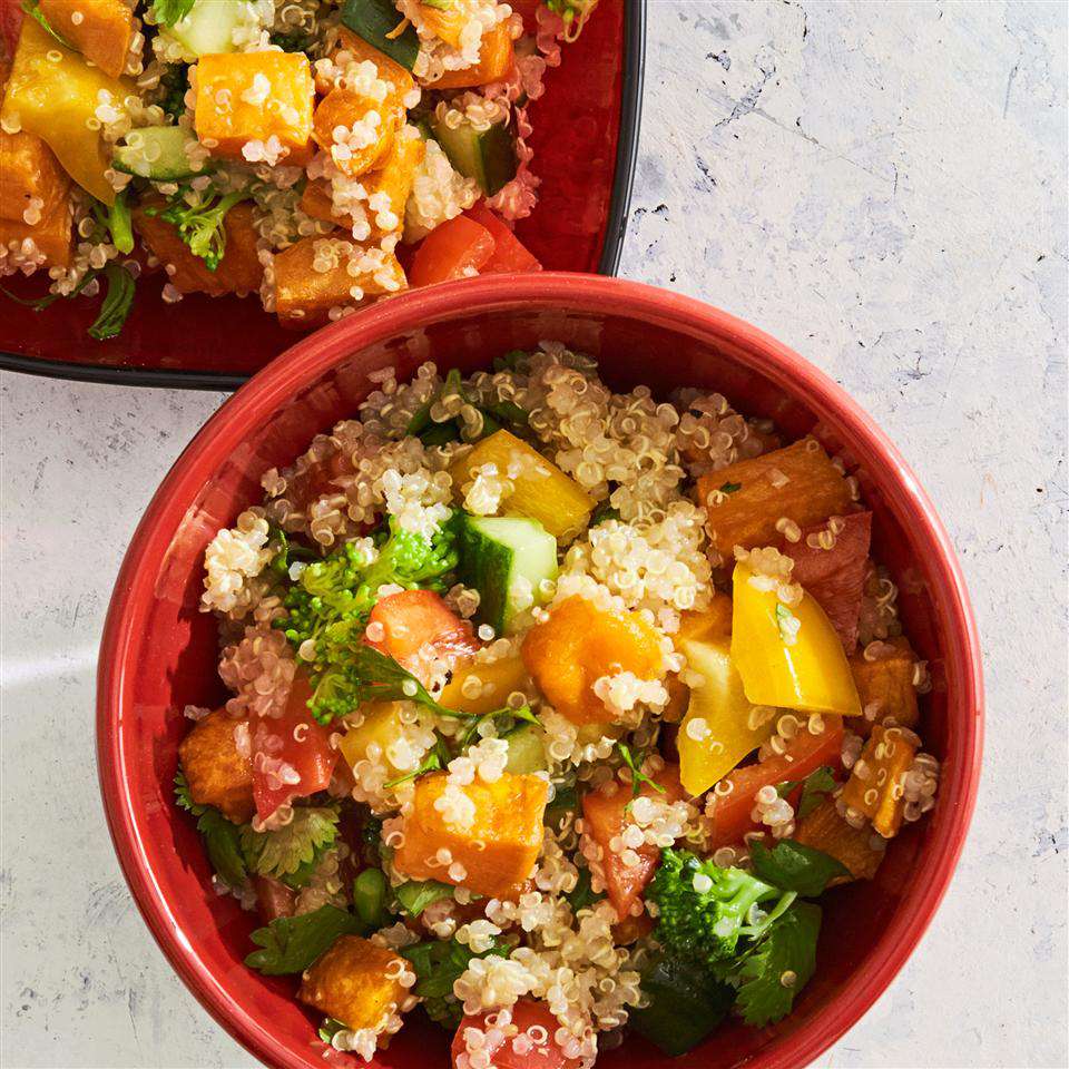 Roasted Sweet Potato Quinoa Salad on red dishes