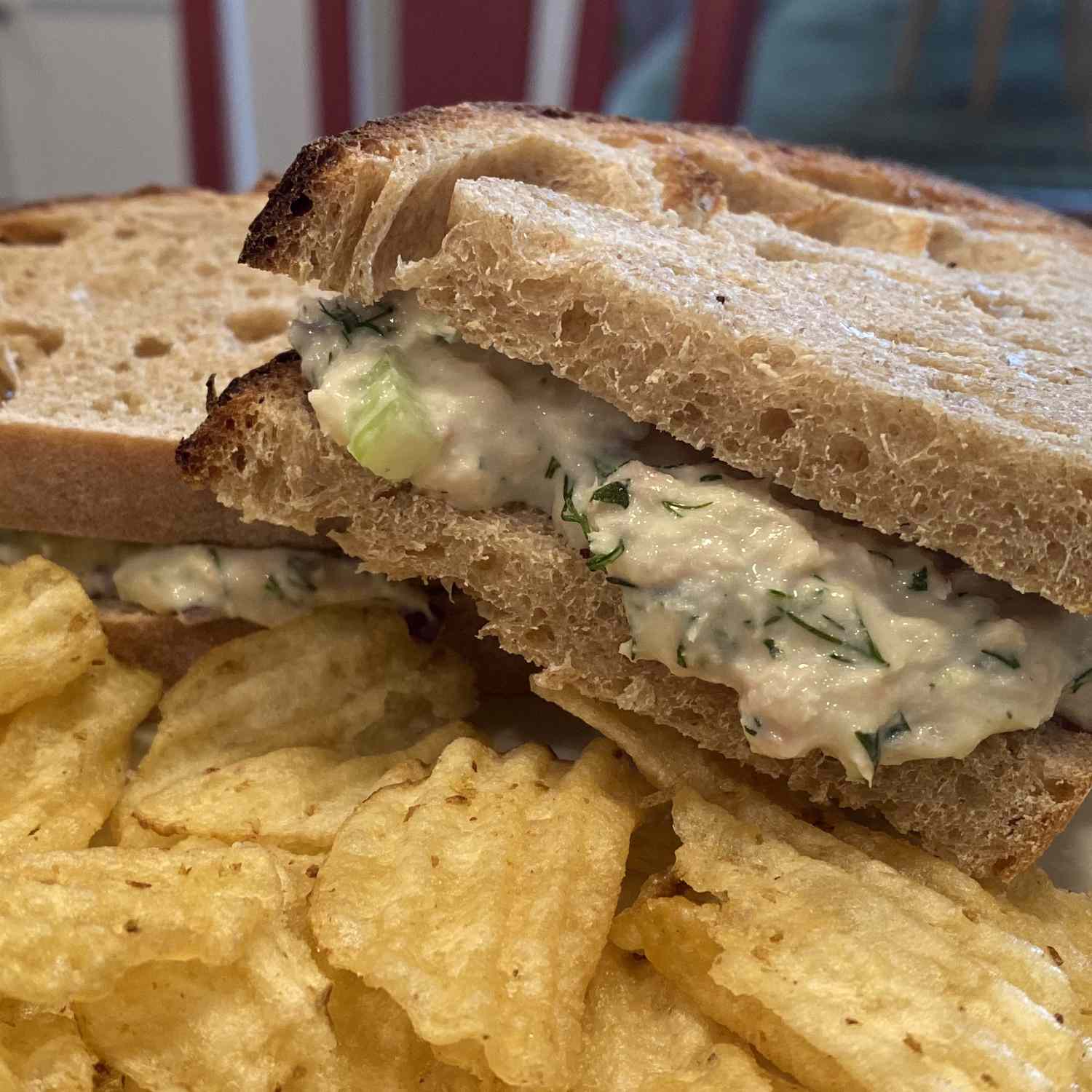 Tuna Salad With Fresh Dill in a sandwich with chips