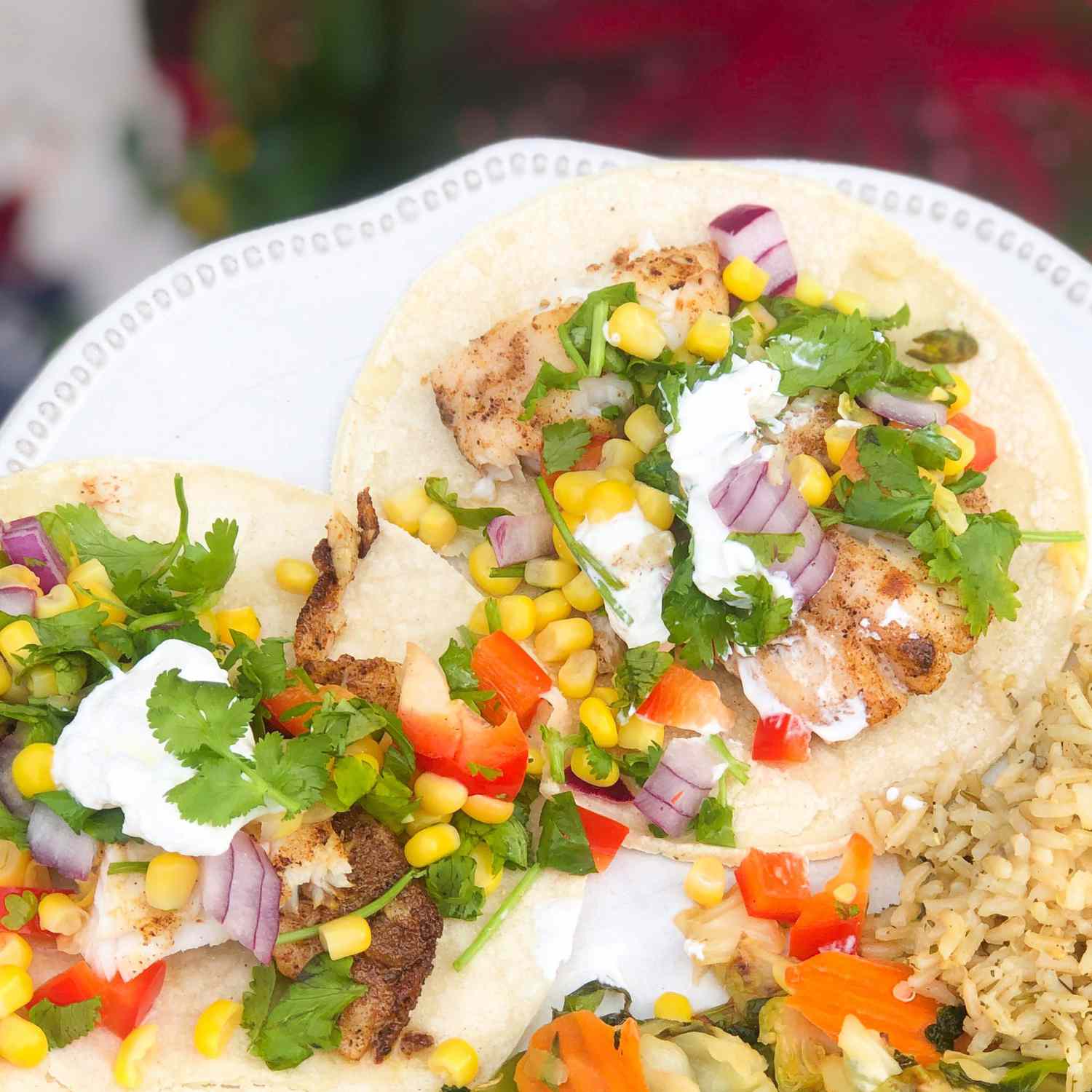 a white plate Fiery Fish Tacos with Crunchy Corn Salsa