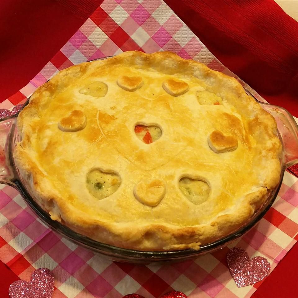Baked veggie pot pie with heart shapes cut from the crust