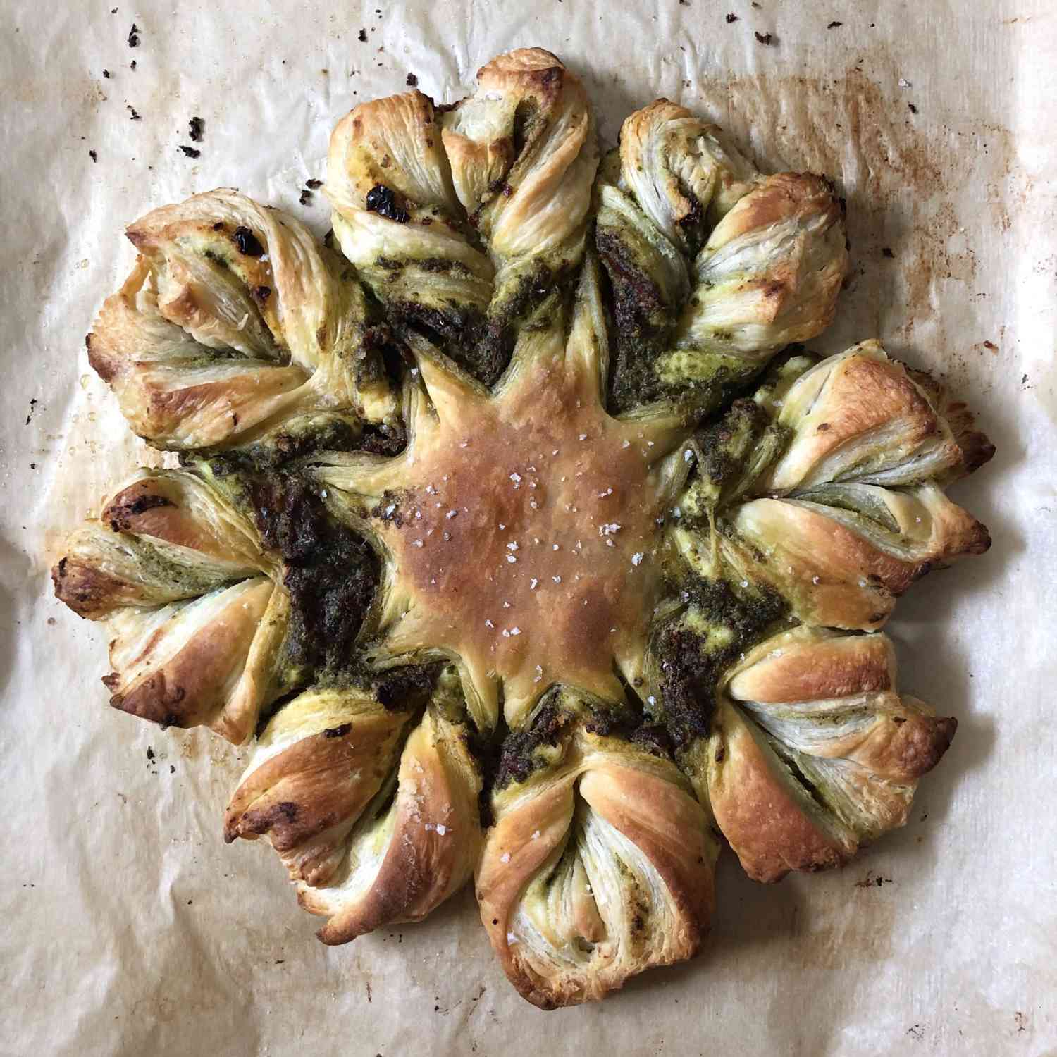 Pesto Puff Pastry Pinwheel on parchment paper