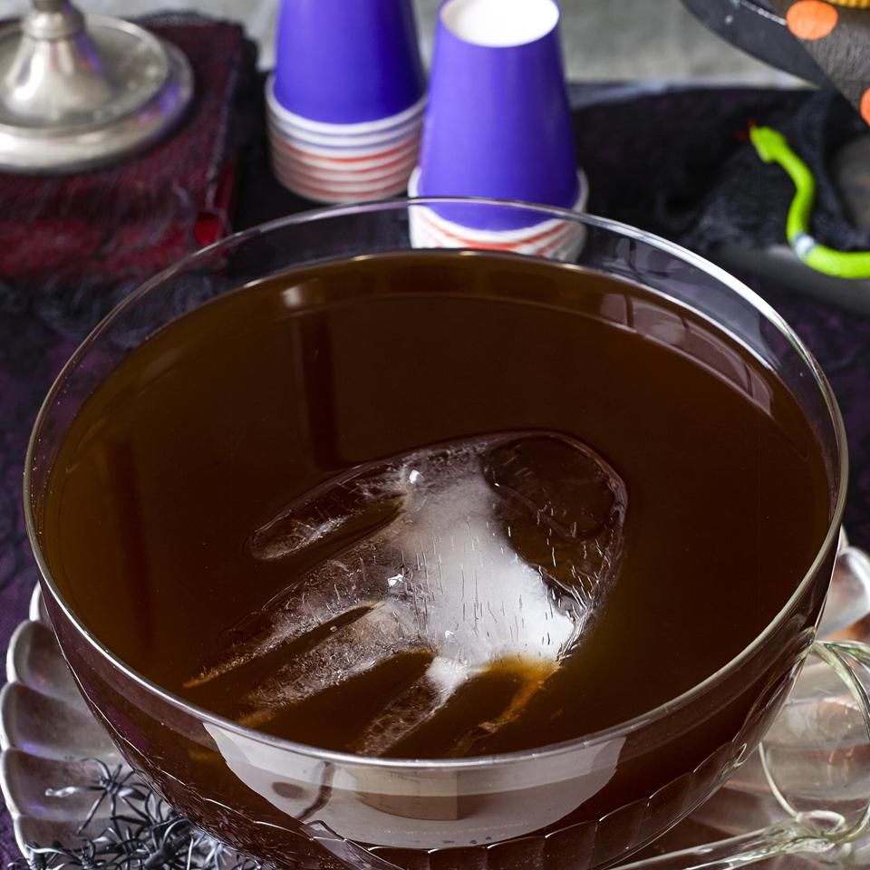 Black Halloween Punch in a glass bowl