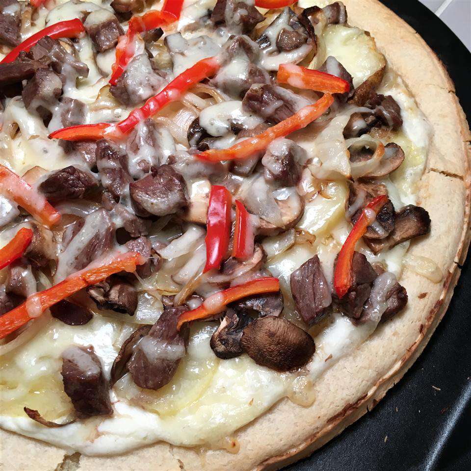 Prime Rib Pizza with mushrooms and bell peppers