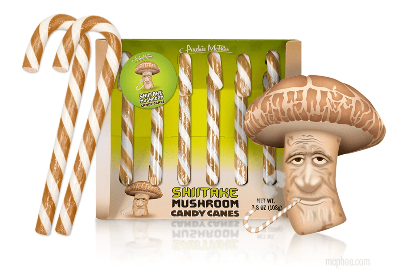 Archie McPhee Shiitake Mushroom Candy Cane box with mascot mushroom beside the box