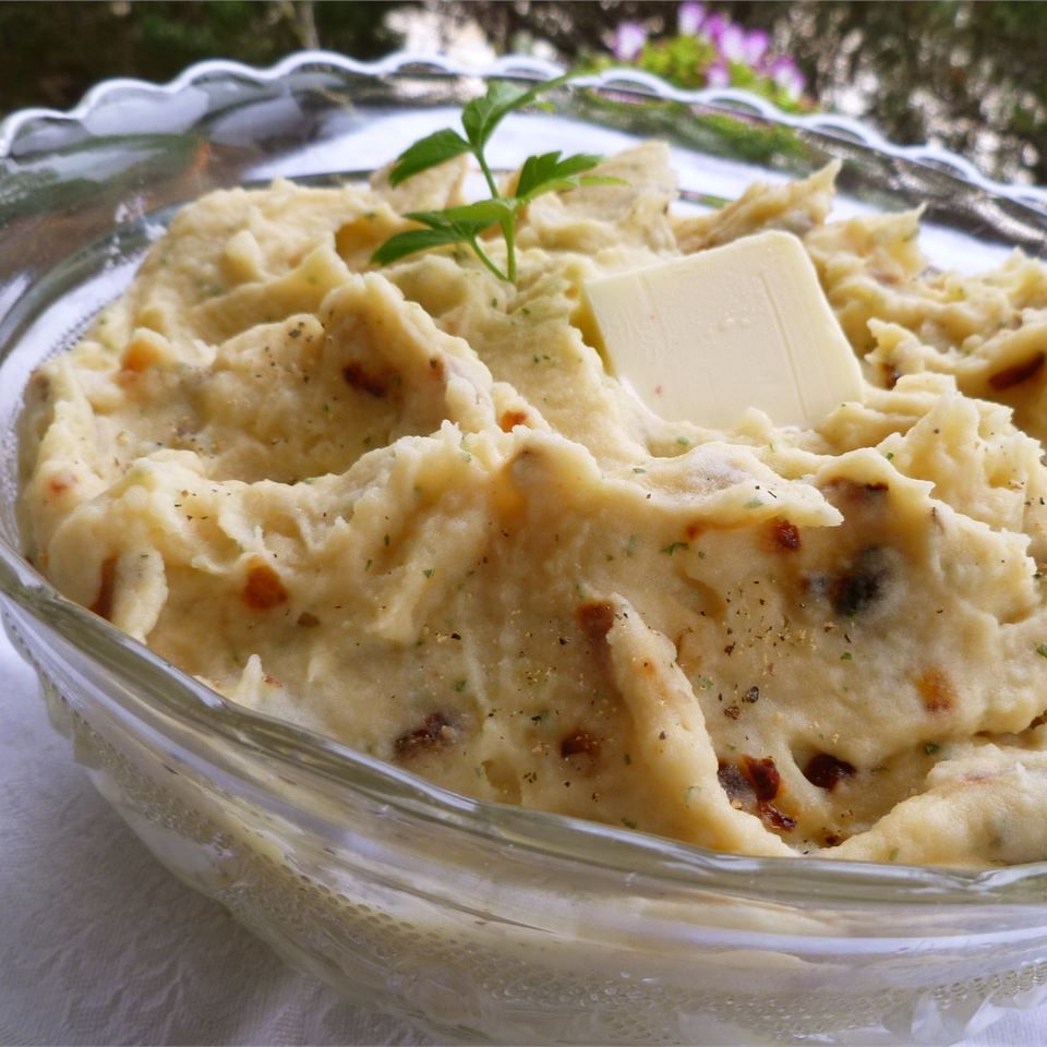 Addictive Mashed Potatoes in a glass bowl