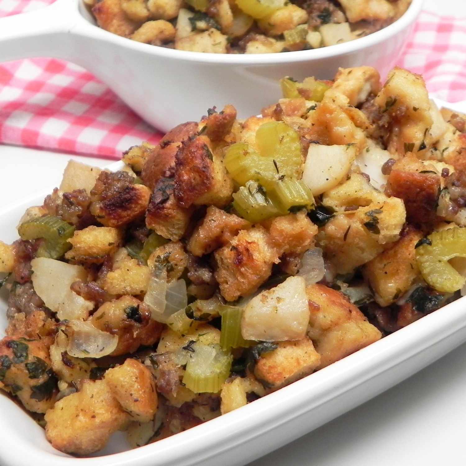 sausage stuffing in a white dish